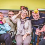Senior adults in a nursing home for the elderly having fun
